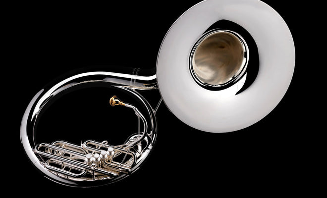 How is a concert tuba different from a sousaphone?
